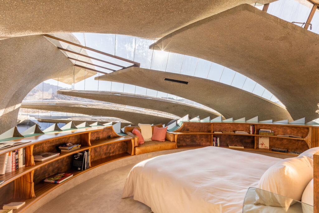Another bedroom has a rib cage styled roof with night sky views