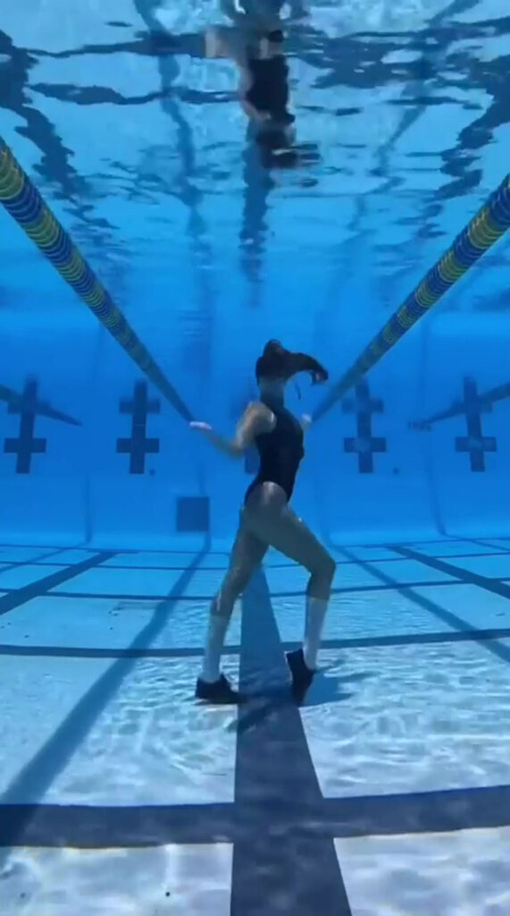 Kristina performing a moonwalk underwater