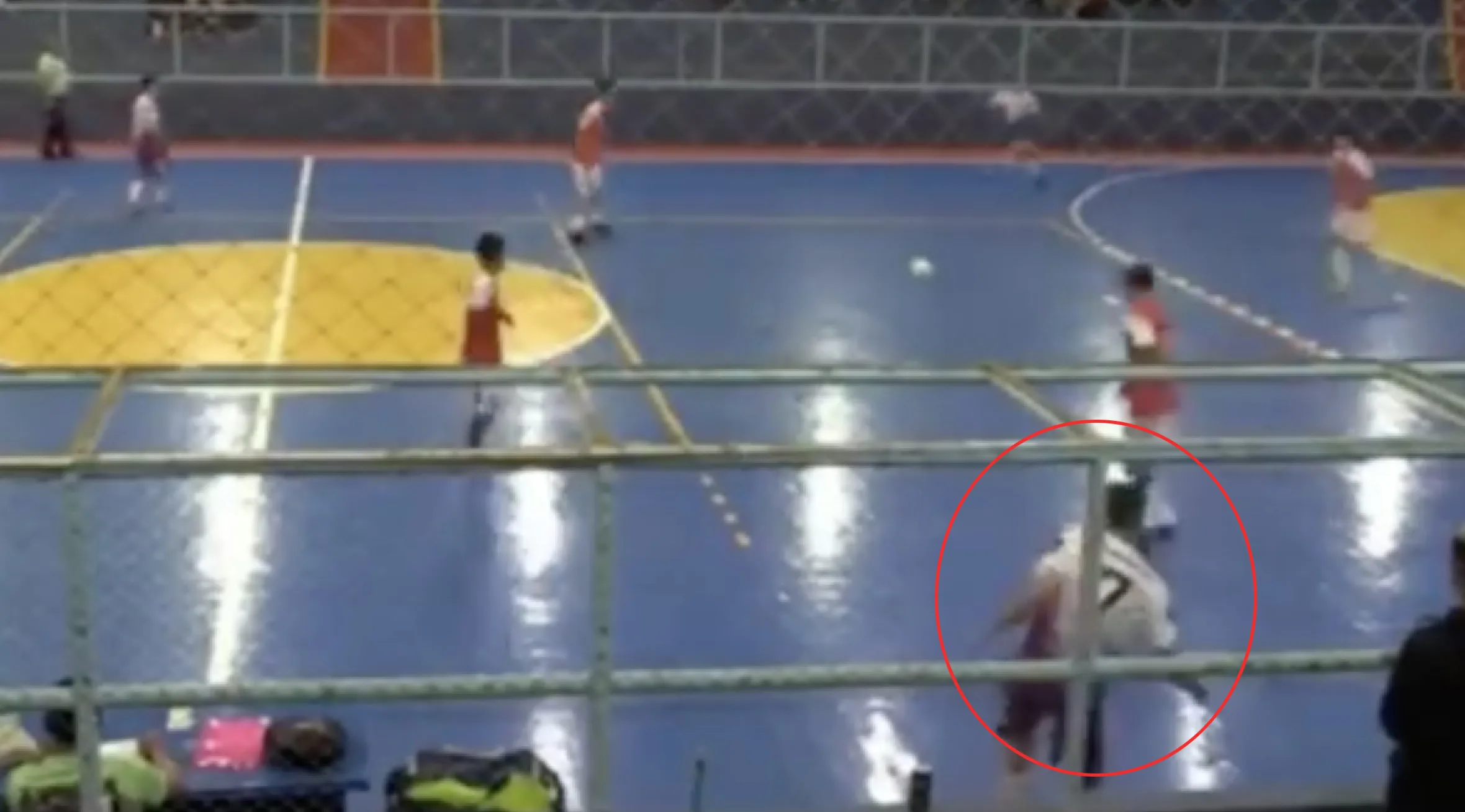 Video grab showing Guilherme Carvalho Castaman at his futsal match when he mysteriously drops dead.