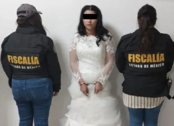 The bride who was arrested on her wedding day for alleged extortion.