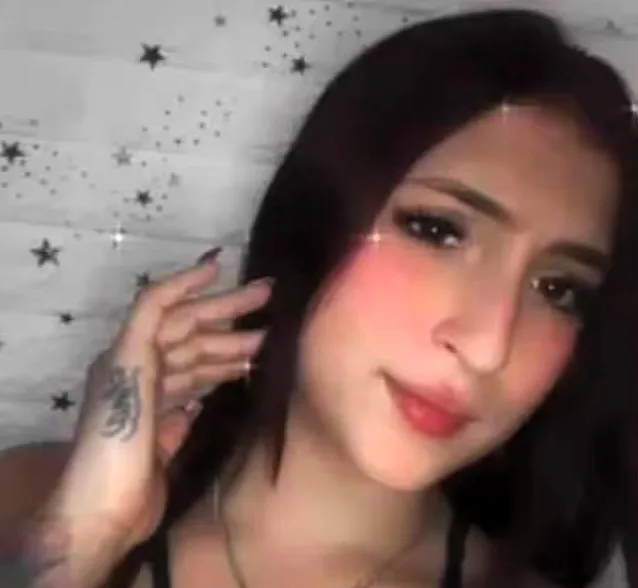 Laura Isabel Lopera, a 20-year-old mother, was found in a suitcase in Medellín, Colombia. Authorities are searching for a foreign national suspected in her murder, with signs of violence on her body.