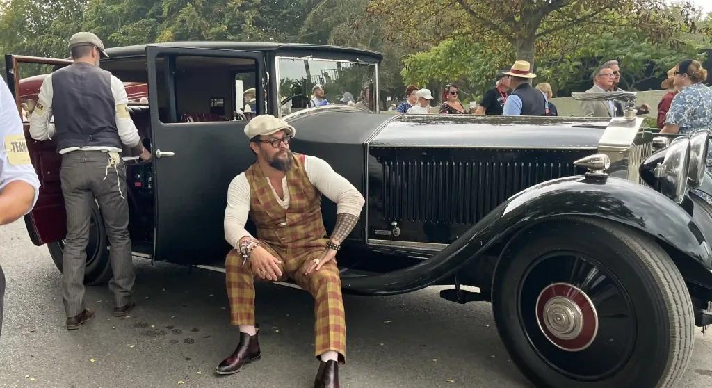 Hollywood actor Jason Momoa transforms his vintage Rolls-Royce into an electric car to blend his passion for cars with environmental consciousness.