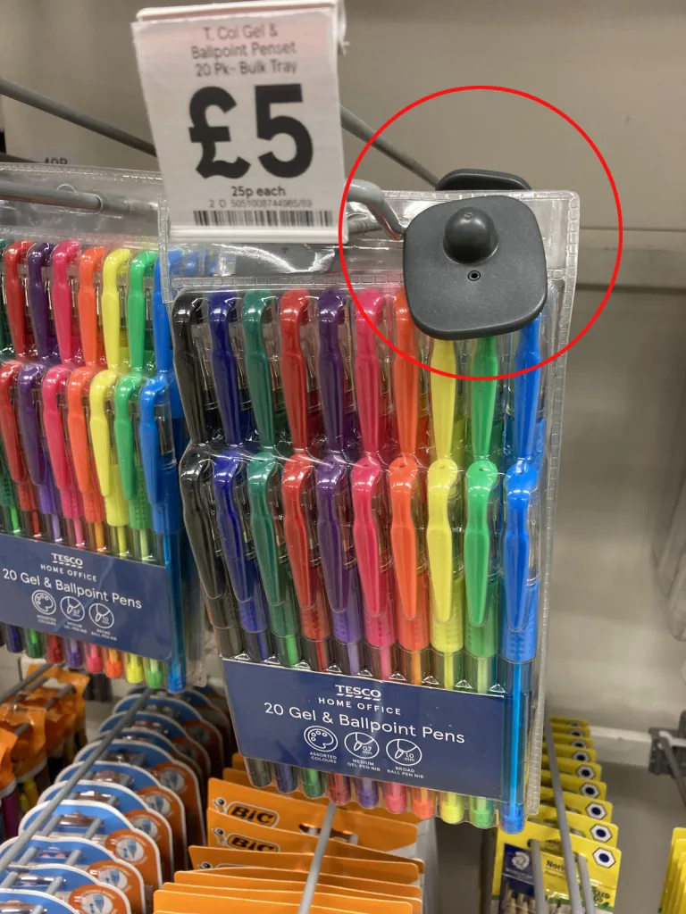 Tesco's security tags on 18p colouring pencils raise eyebrows as cost-of-living crisis sees shoplifting cases surge. Customers puzzled by tags on inexpensive stationery items, sparking questions about theft prevention measures.