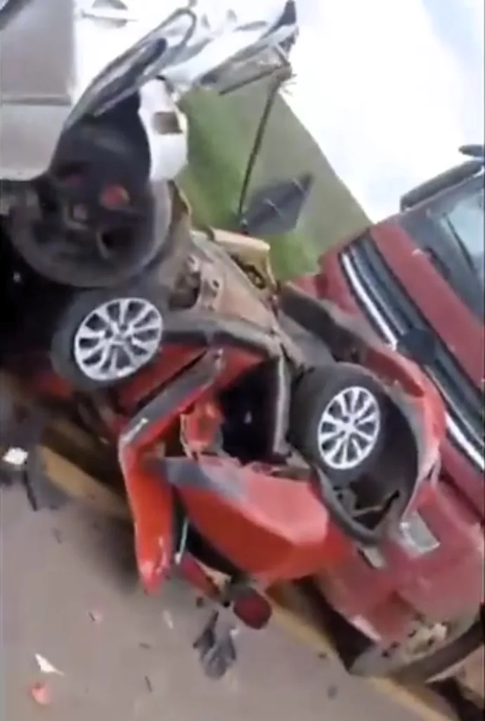 the trapped woman filmed a selfie video from her mangled car after miraculously surviving a horror pile-up, asking for help while calming her anxious husband and praying to God. Tragically, three family members in another car were killed in the crash.