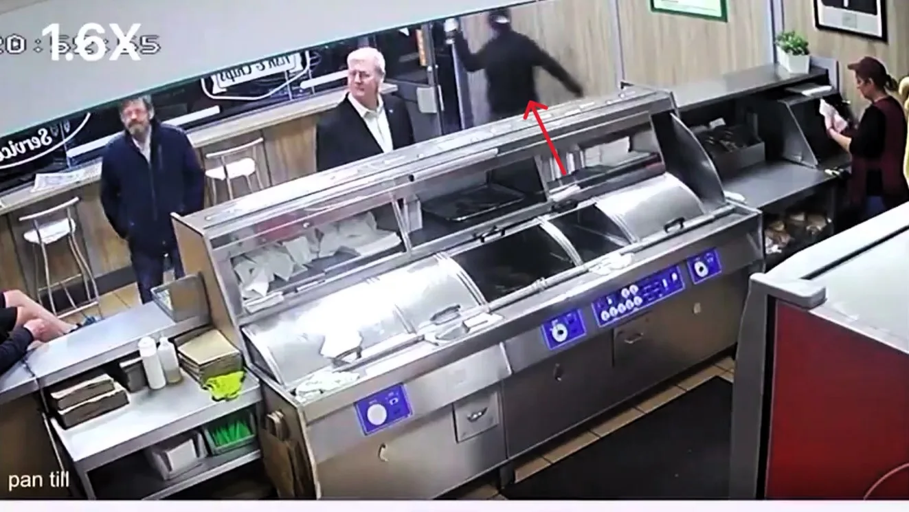 A masked assailant threw a Molotov cocktail into a fish and chip shop, startling elderly customers awaiting their meals. Quick-acting staff swiftly extinguished the flames, averting a potential disaster. Security footage captured the shocking incident at Zia’s takeaway in Dublin.
