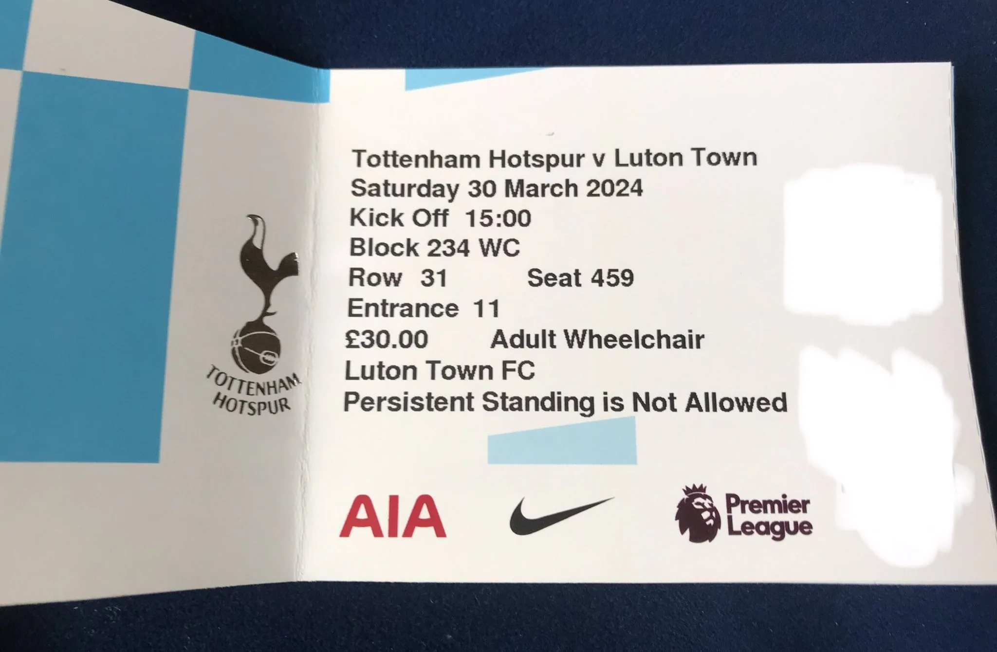 A wheelchair-bound Luton fan was surprised when his Tottenham ticket warned against "persistent standing," despite being for a "wheelchair adult." Spurs supporters and football fans shared mixed reactions to the blunder, with some finding humor in the situation.