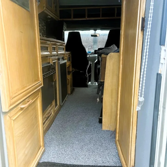 Cheeky motorhome owner rents out parked van at £500 a month – you have to sleep on a table, enjoy cold showers and empty your own toilet