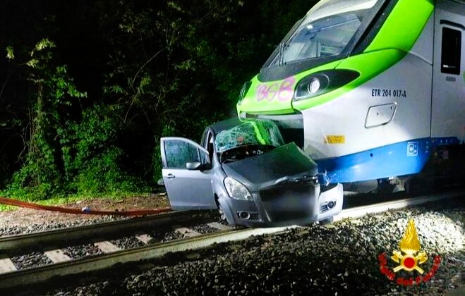 Horror as train slams into woman’s car killing her and pushes it 100m down tracks
