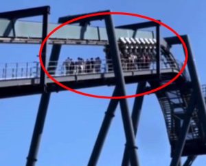 A technical glitch left dozens stranded atop a roller coaster in Italy's Mirabilandia theme park. The Katun ride halted due to sensor issues, but all passengers were safely evacuated without incident.