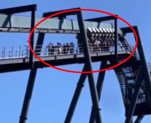 VIDEO: Terrifying moment thrill seekers are stranded at top of roller coaster