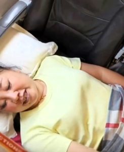 A passenger was removed from an Air Guilin flight after allegedly refusing to sit properly and causing a delay. The woman, claiming illness, insisted on lying across two seats despite crew instructions. After a prolonged argument, she agreed to leave the plane, causing a delay of over two hours.