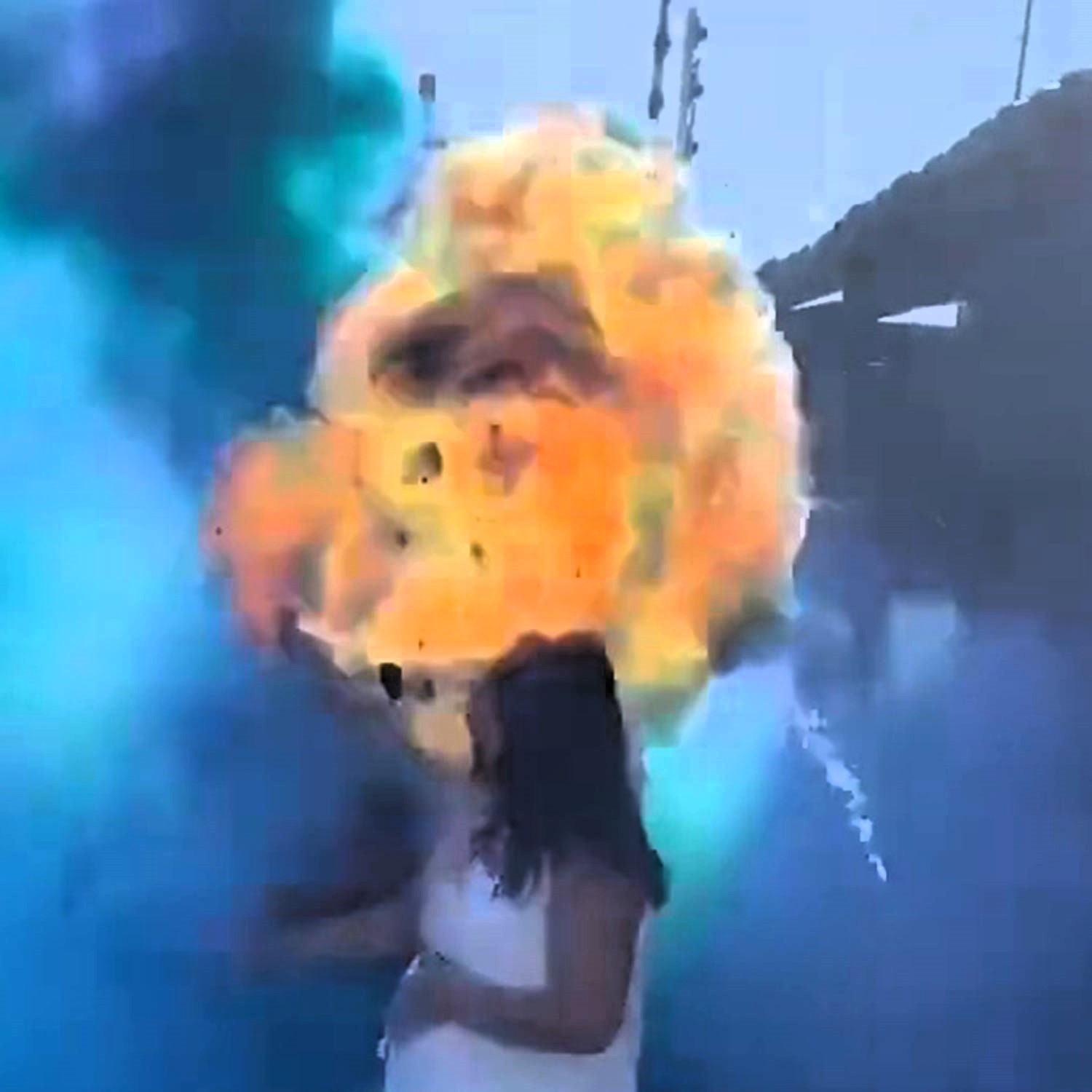 A father narrowly escaped serious injury when a smoke bomb exploded during his gender reveal party in Linhares, Brazil. Footage shows Carlos Henrique engulfed in blue smoke before a fireball ignites, causing minor burns.