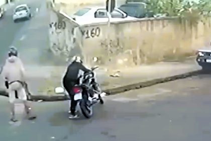 A have-a-go hero stops a mugging with a flying kick, caught on CCTV in Belo Horizonte, Brazil. The hero foils the crooks' getaway, leaving them empty-handed and battered.