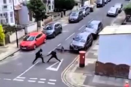 Two men engage in a chilling machete fight on a residential street in Tottenham, leaving one hospitalized with non-life-threatening injuries. Police are investigating; no arrests made.