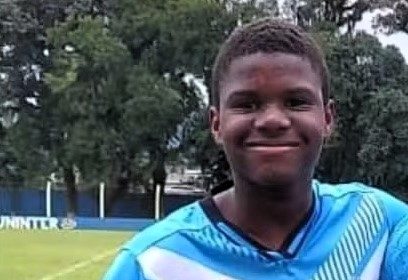 Aspiring footballer Sterdji Charlotin, 12, tragically died from a sudden illness during a match in Brazil. Despite no known health issues, he collapsed and passed away en route to the hospital.