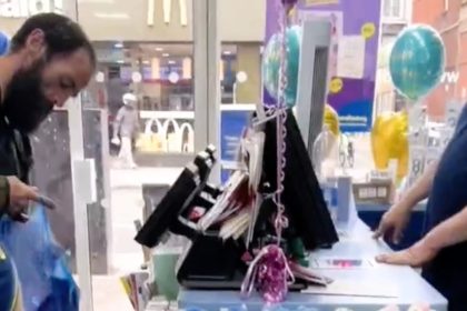 A man brazenly shoplifted goods from Card Factory in Holloway, stuffing them in a blue bag while staff were powerless to intervene, highlighting rising thefts amid the cost-of-living crisis.