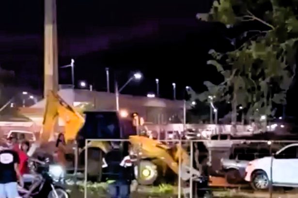 An allegedly drunk man in Brazil destroyed several cars and motorcycles with a JCB, injuring multiple people, after losing patience in a gridlocked car park. He faces charges of DUI and property damage.