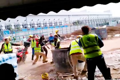 Mass brawl erupts at Johor construction site: workers use hard hats and planks as weapons. Police investigate under Penal Code Section 148 for rioting with weapons.