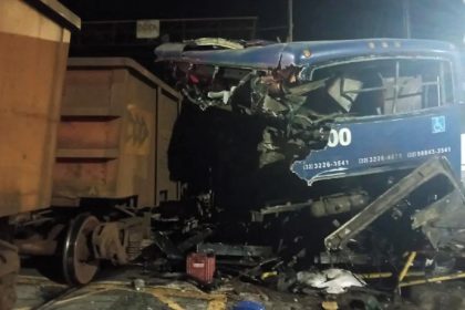 Driver and passengers escape unscathed as their broken-down coach is split in half by a train in Juiz de Fora, Brazil. The vehicle was damaged beyond repair, but no injuries occurred.