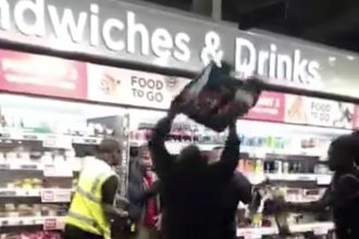 Suspected thief cornered by Asda workers in Leyton, East London, after attempting to steal alcohol. Amid rising shoplifting rates, staff fought back and escorted him out.