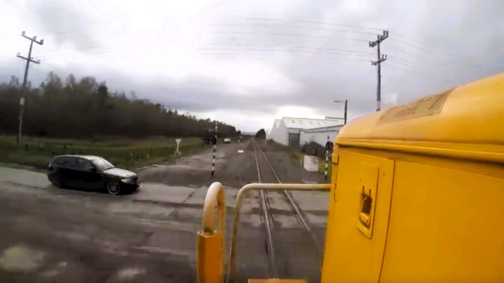 Horror moment train smashes into car at level crossing | Need To Know
