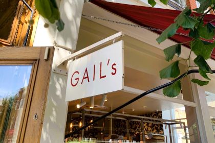 Residents of Walthamstow Village rally against the opening of a Gail's bakery, fearing it will threaten local businesses and disrupt the community's unique character.