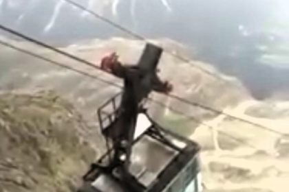 Thirty tourists trapped in a swaying mountain cable car for four hours after a lightning strike in Italy's Tofane range. Passengers feared for their lives before safe rescue.