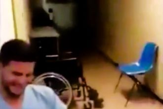 Medics flee in fear after spotting 'boy ghost' in hospital corridor. Viral clip of eerie figure dragging itself along the floor shocks social media with over 172,000 views.