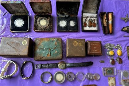 Litter pickers in Plymouth discover stolen war medals and priceless jewelry hidden in a pillowcase, five years after a high-value burglary. Police investigation ongoing.