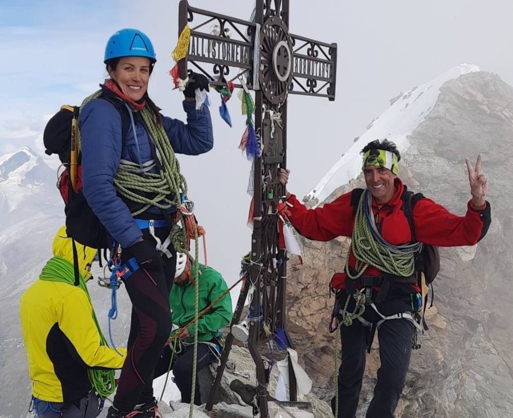 Two climbers found dead in each other’s arms on Mont Blanc after freezing temperatures and strong winds, following a frantic call for help during a snowstorm.