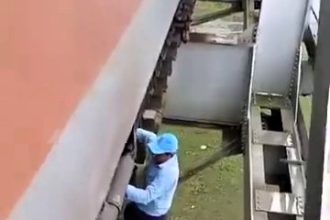 A fearless train pilot in Assam, India, risked his life by climbing outside a halted train on a bridge to fix an air leak, impressing viewers with his bravery and skill.