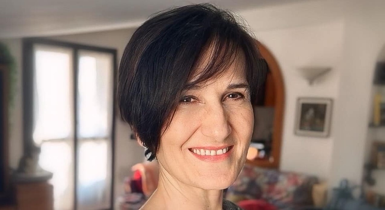 Man allegedly stabs sister-in-law to death over long-standing parking dispute in Italy. Victim remembered for kindness as tragic family conflict shocks community.