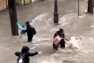 Child narrowly avoids being swept away in Spain's severe floods as family faces terrifying moments in murky floodwater; deadly storms leave widespread damage.