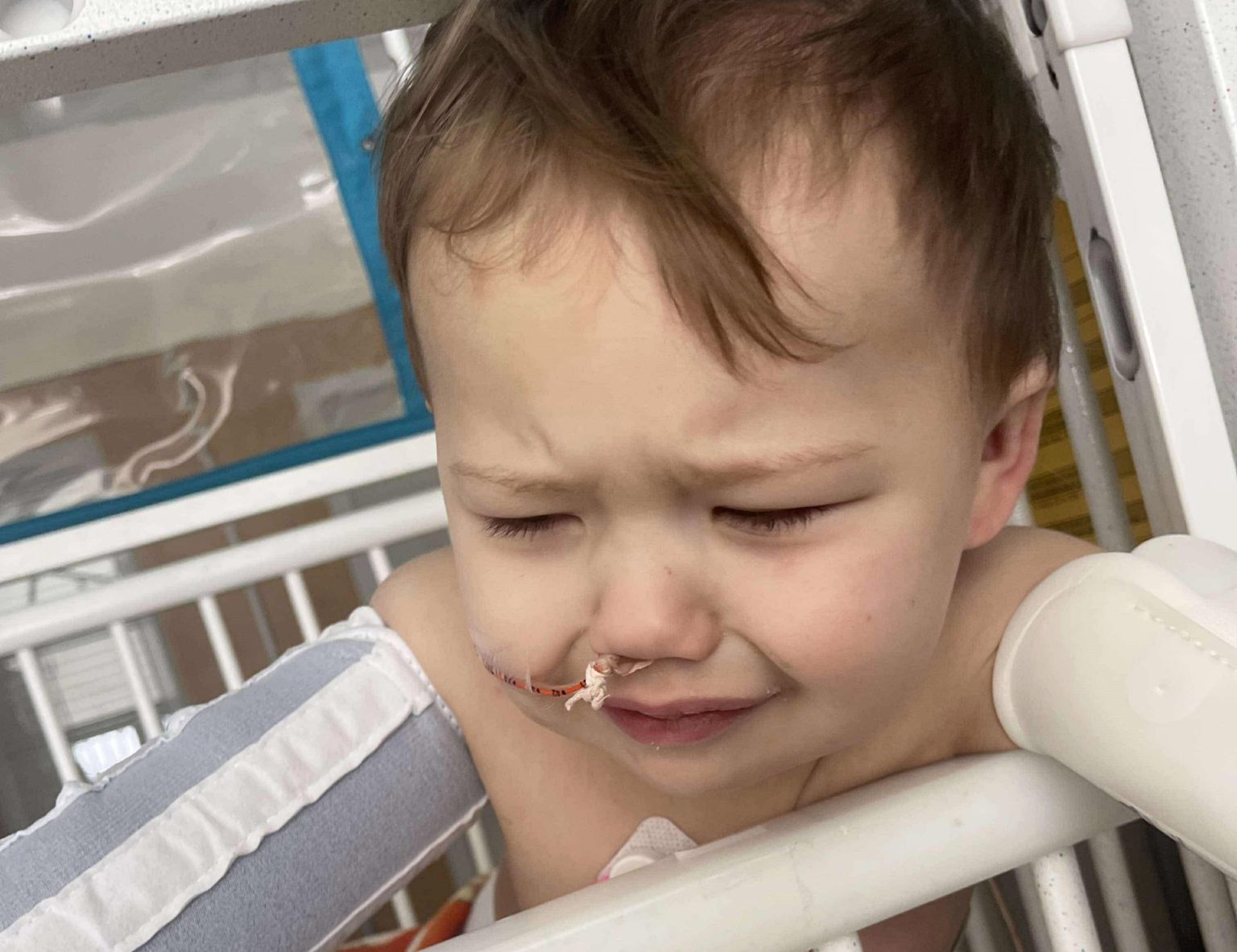 Toddler survives life-threatening injury after swallowing button battery, leaving parents urging others to avoid battery-powered toys to prevent similar accidents.