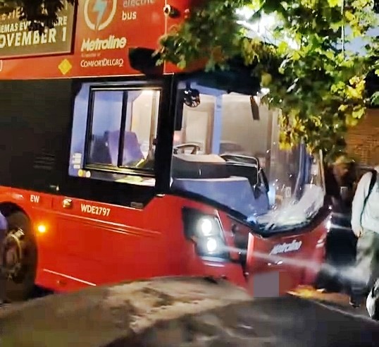 Passengers evacuated after a Metroline double-decker bus crashes into a Mini in Kingsbury, west London. The bus sustained damage, and authorities are investigating.