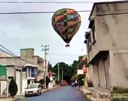 Three hot air balloons forced to crash land near Mexico City due to strong winds, with minor injuries reported. Local residents call for stricter flight path regulations.