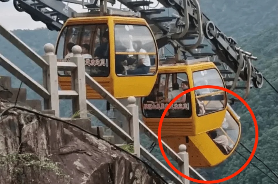 A tourist fell 30ft from a cable car in China after strong winds caused the doors to open. She survived with non-life-threatening injuries. An investigation is ongoing.