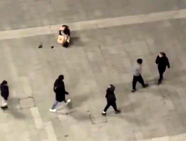 Mass brawl outside Wembley Stadium sees youth brandish a huge knife during the fight. No injuries reported, and police are investigating. Witnesses call for action.