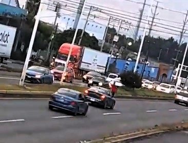 A suspected "claim cheat" in Mexico staged getting hit by a car but was ironically run over in a real accident, caught on viral footage, sparking social media reactions.