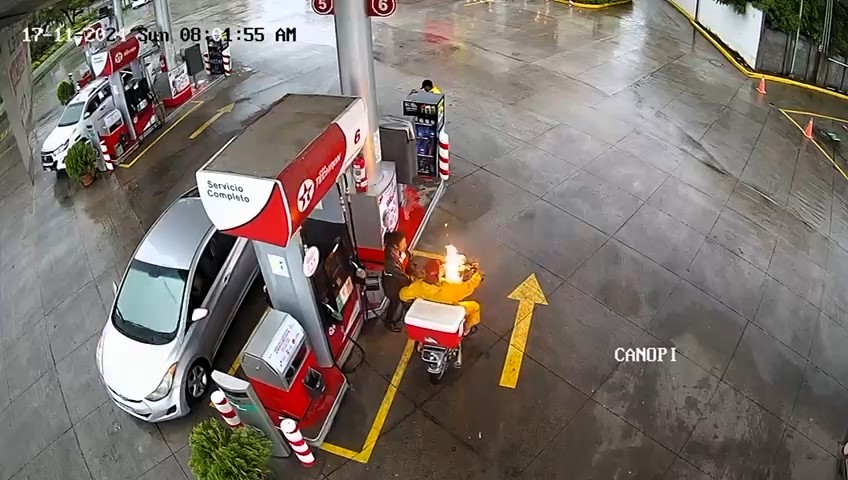 Motorcyclist's routine fuel stop turns terrifying as sparks ignite flames, caught on camera in Honduras. Quick action averts disaster; no serious injuries reported.