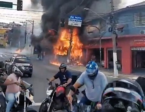 A flaming bus in São Paulo, Brazil, rolled into a utility pole, sending thick black smoke into the air. Passengers had been evacuated, and no injuries were reported.