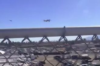 A plane crash at a Pomona race track during NHRA Winter Nationals left three injured but no fatalities, as dramatic footage captured the shocking moment.