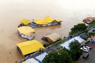 A Malaysian businesswoman's £214,000 houseboat restaurant was swept 5km downstream by floods after a tree damaged its mooring. Recovery efforts saved it, but losses total £143,000.