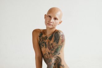 Brave Marisa Kimmel shares her journey after a double mastectomy and living with alopecia, defying trolls to inspire thousands with her confidence and strength.