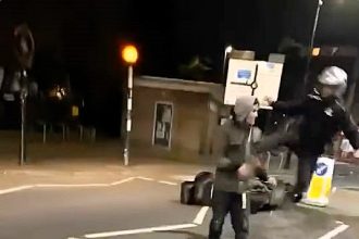 Yob pushes over motorbike, gets instant karma as rider delivers a flying kick in Cheltenham. Locals compare the move to Street Fighter and Kung Fu Panda!