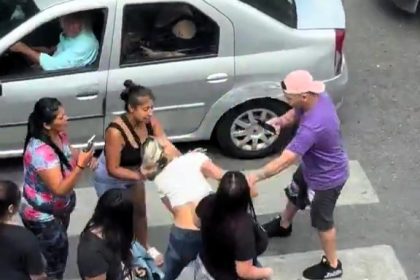 Suspected pickpocket dragged and beaten by angry locals in Buenos Aires shopping district. Viral video captures chaotic street scene as tensions rise during festive season.