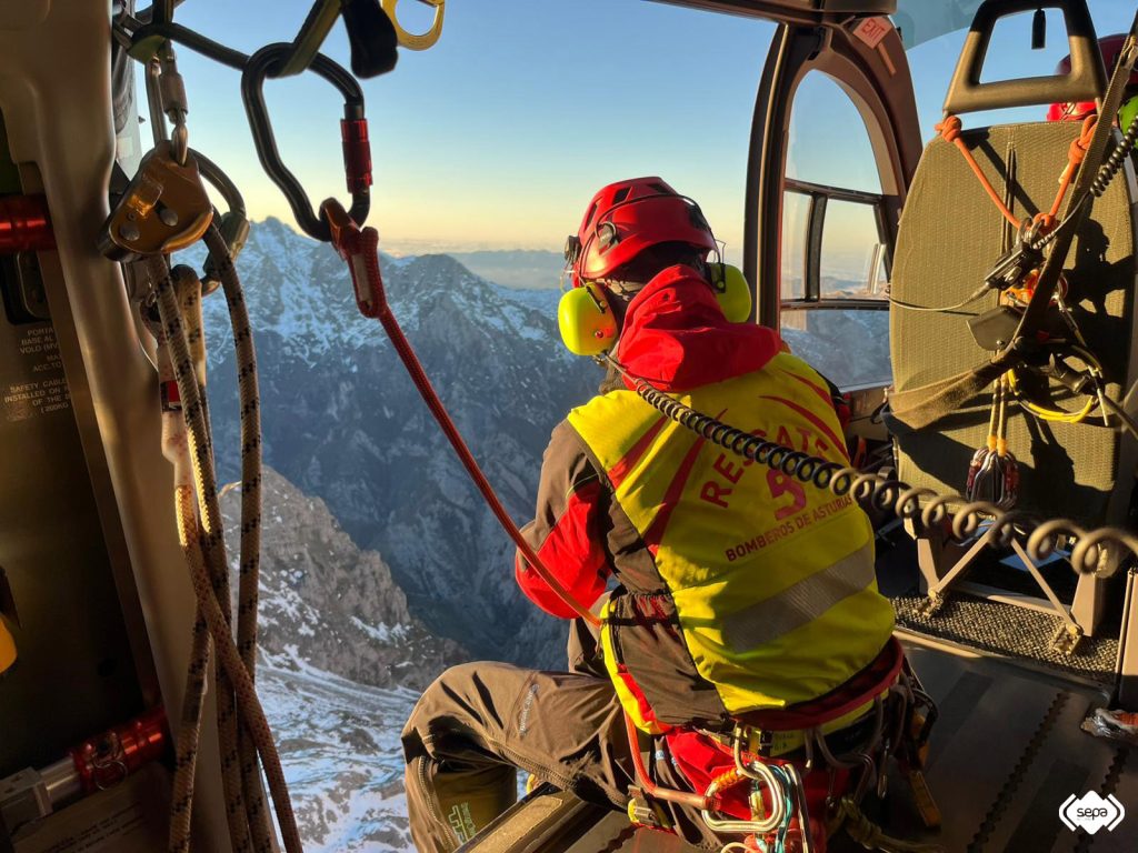 Climber rescued after four days missing in Spain's Picos de Europa, surviving by sleeping between rocks. Found with injuries, rescue described as "finding a grain of sand in the desert."