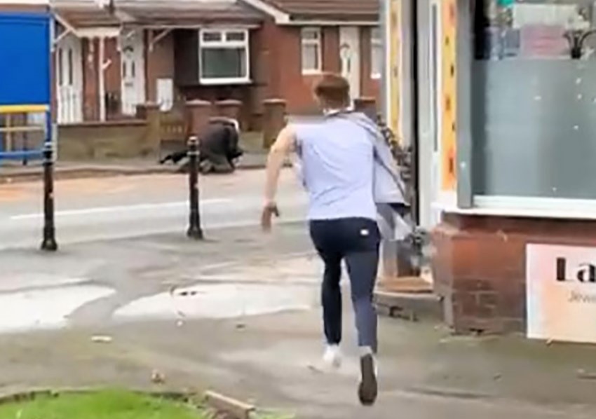 Mid-haircut hero rushes to save officer under attack in Cheshire. Kyle Whiting dashes out from barber's chair, cape still on, to assist a cop in distress.