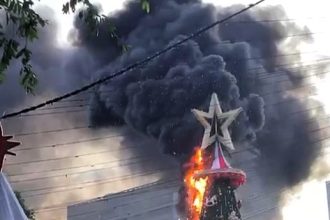 A 75ft Christmas tree in Manaus, Brazil, burst into flames during a lights switch-on, shocking onlookers. Firefighters quickly extinguished the blaze.