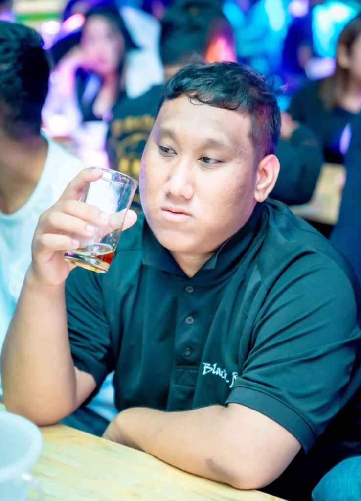 Tragic loss: Influencer dies after drinking a bottle of whiskey for £700 dare, sparking outrage and condolences for his family. Community rallies for justice and support.